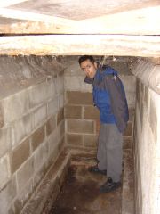 Me in the inspection pit. It's 167cm deep and 105cm wide. Space enough for a couple of bottles of wine.