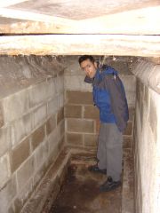 Me in the inspection pit. It's 167cm deep and 105cm wide. Space enough for a couple of bottles of wine.