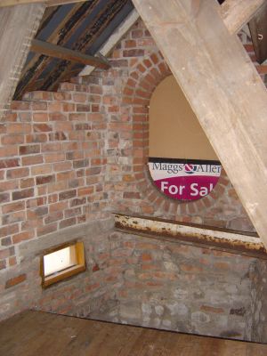 Boarded up - the round window at the front.