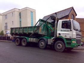 Delivery of a 20 yard roll on roll off skip...